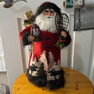 Red Santa Figurine with Snowshoes